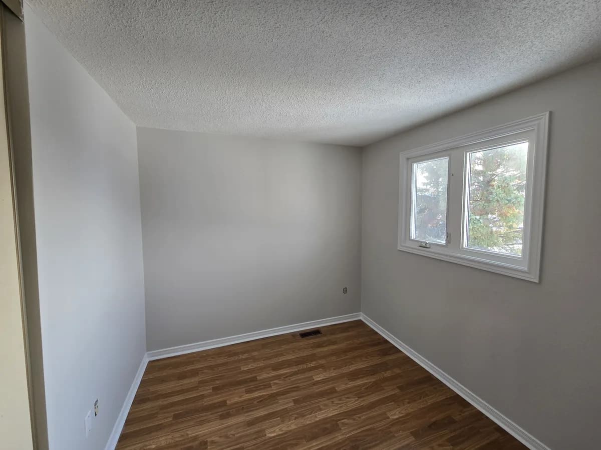 Focused on restoring value and appeal to this Barrie home. We repaired significant wear and tear and applied a fresh, durable finish, taking the property from "bad shape" to freshly repaired and repainted.