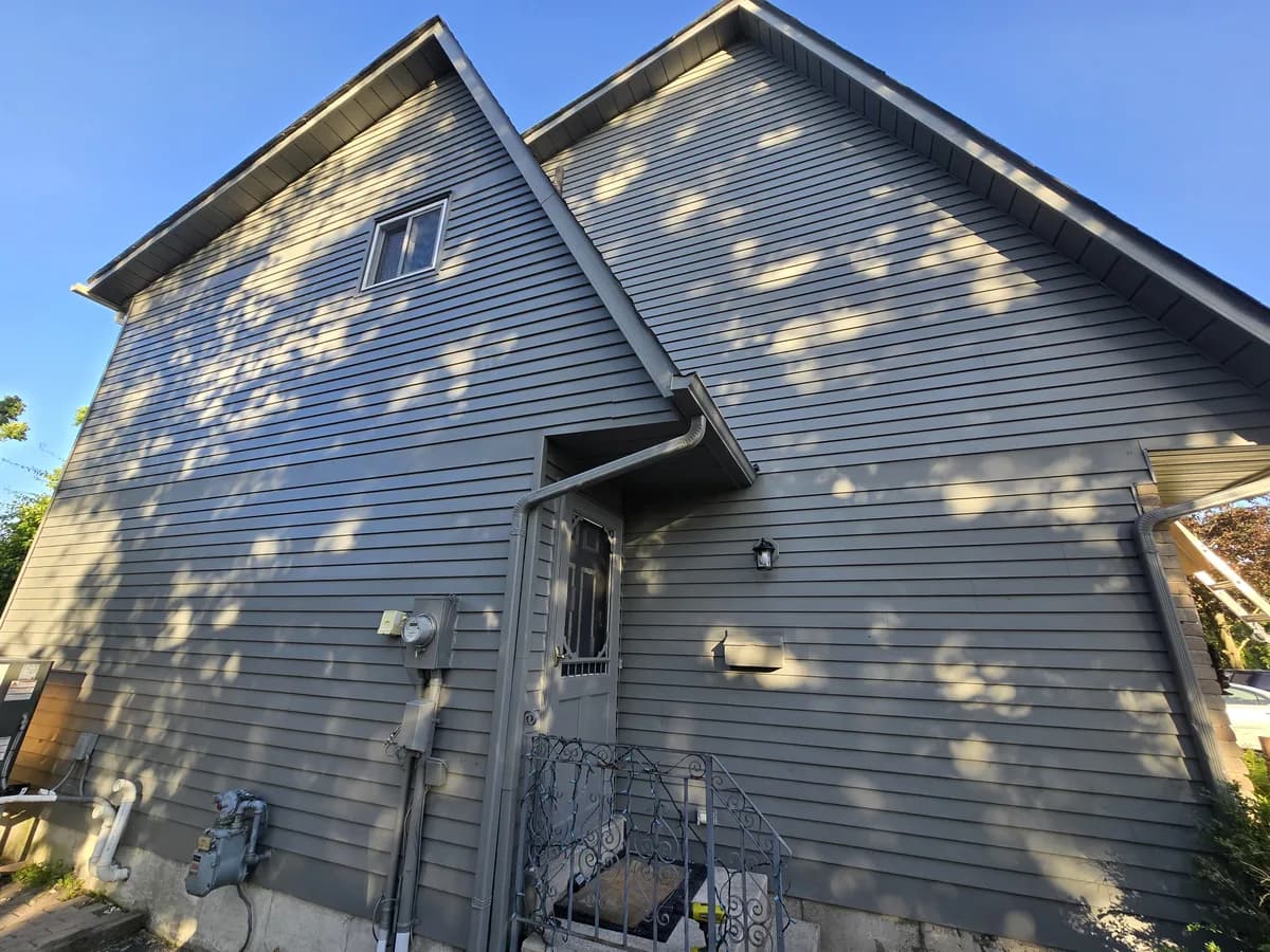 Revitalized weathered metal siding to prepare this home for the market. A professional exterior coating erased years of wear, delivering a refreshed look that improved the property’s curb appeal before listing.