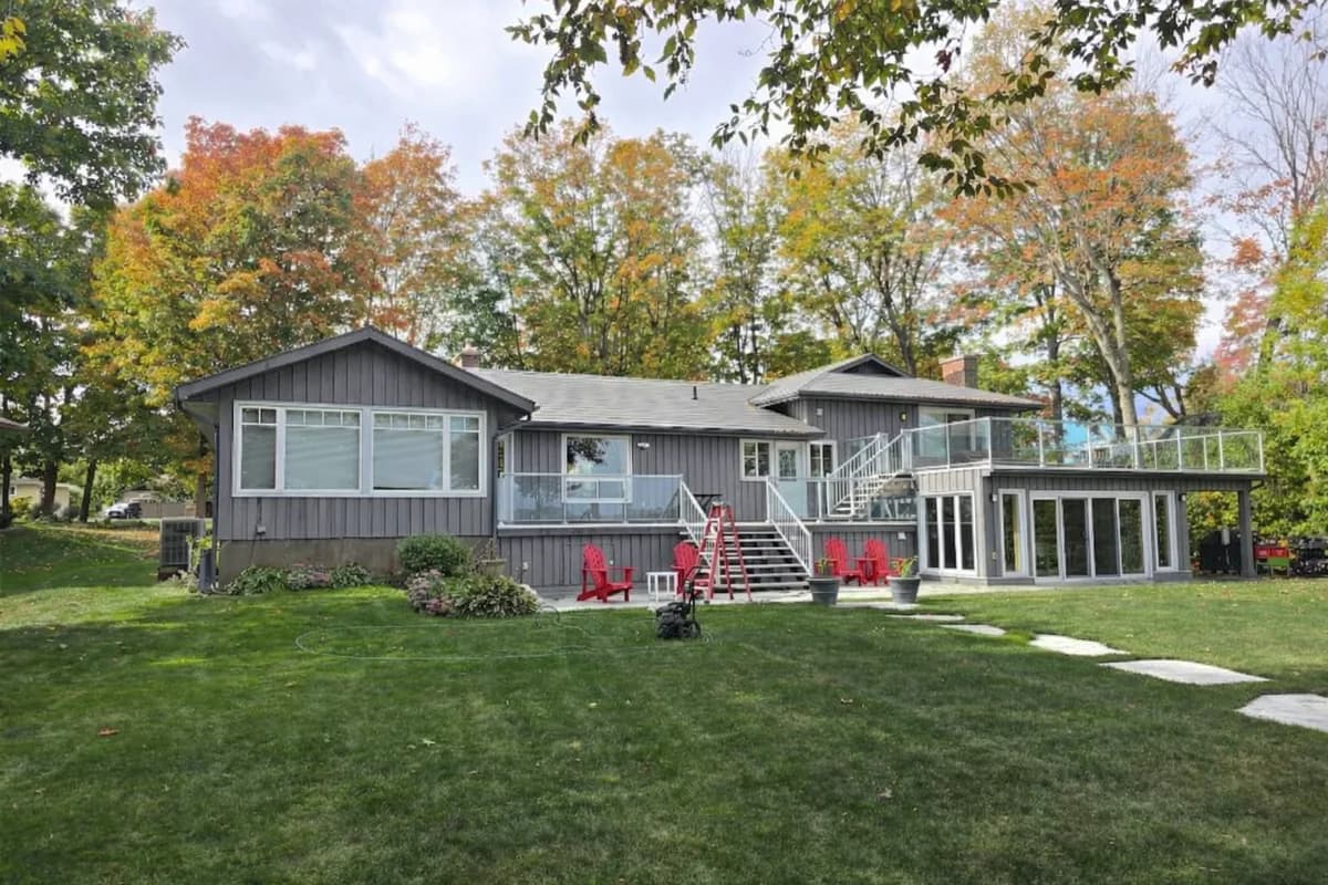 Out with the blue, in with the calm. We updated this cottage with a peaceful, neutral gray, completely changing its presence and providing a durable, professional finish that the owner loves.